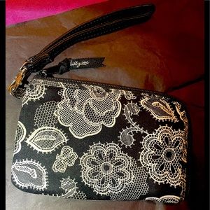 Thirty one’s Corner Zip Wristlet; White Design on Black